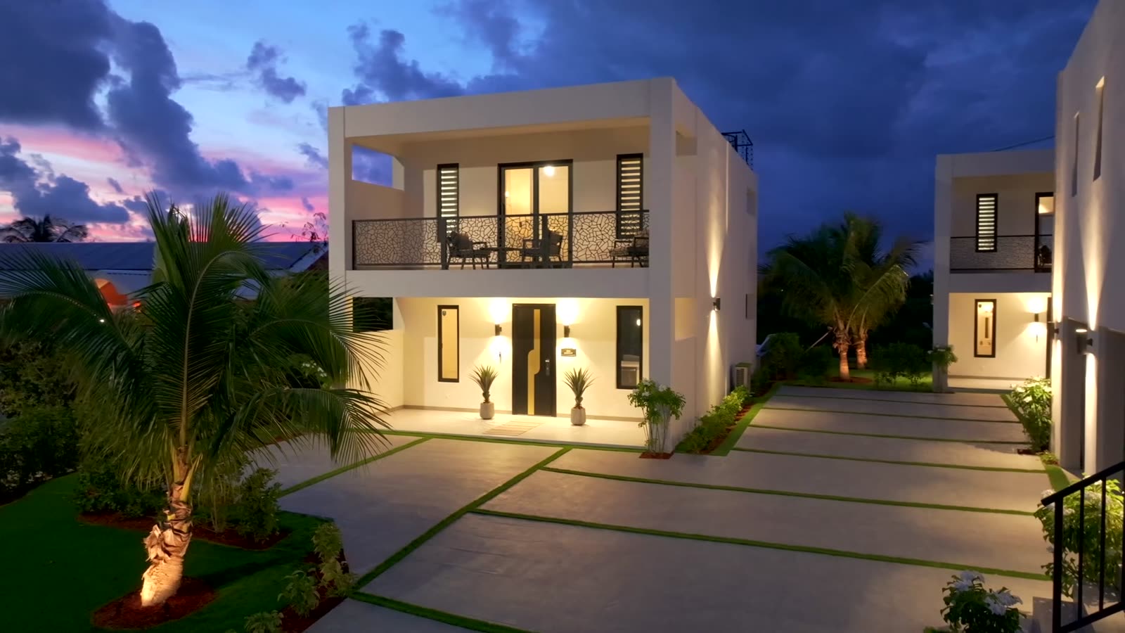 Ideal Honeymoon villa lit up at dusk